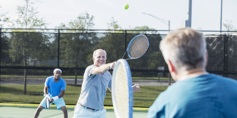 Men playing tennis